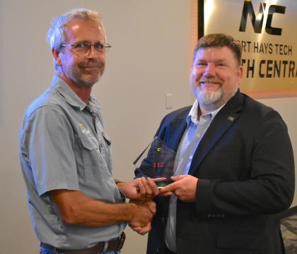Mark Jones receives 212 Award 