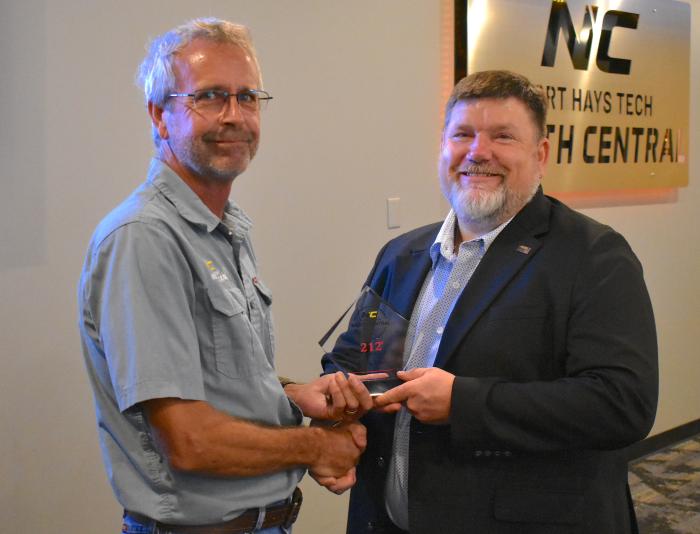 Mark Jones receives 212 Award 